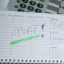 Ein aufgeschlagener Kalender in dem das Wort Sport eingetragen ist