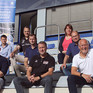 Einige der 14 Absolvent*innen des European Handball Managers mit Studiengangsleiter Dr. Stefan Walzel (oben links)