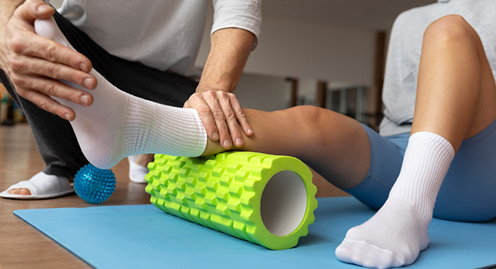 Physiotherapeutische Behandlung des Fußes eine Patientin. 