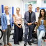 Serap Güler mit Vertreter*innen der Deutschen Sporthochschule Köln