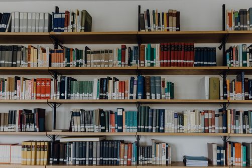 A large bookshelf that isn't quite full
